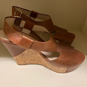 Size 10 wedges worn twice. Excellent condition!